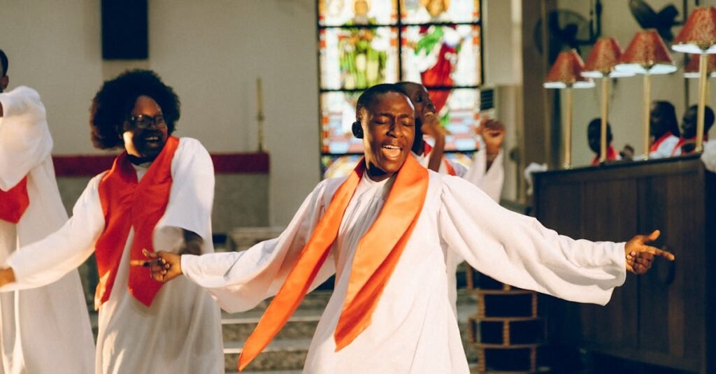 Vibrant church choir singing and dancing with passion in a Lagos church.